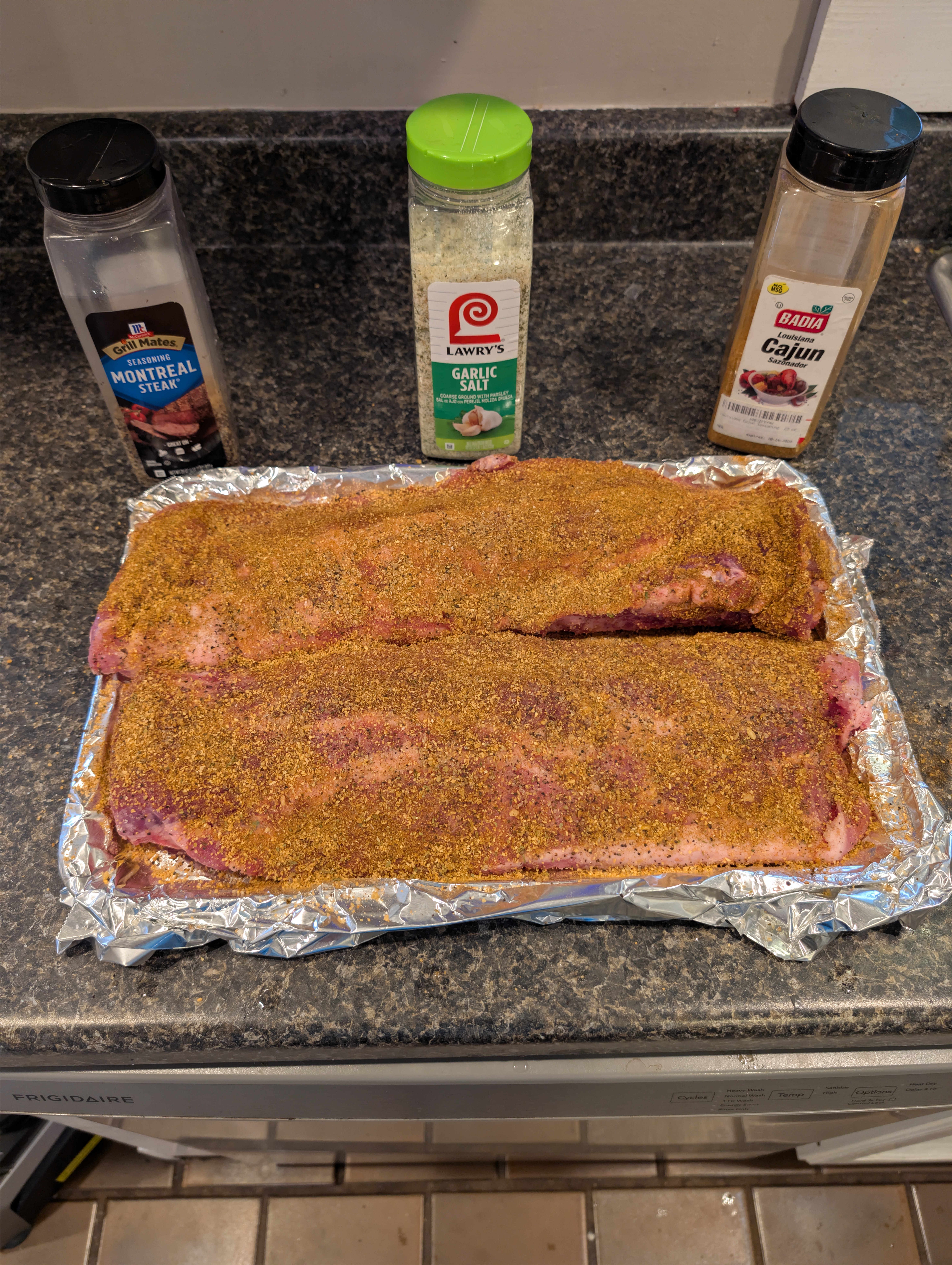 Ribs coated with McCormick Montreal Steak Badia Cajun and Lawrys Garlic Salt