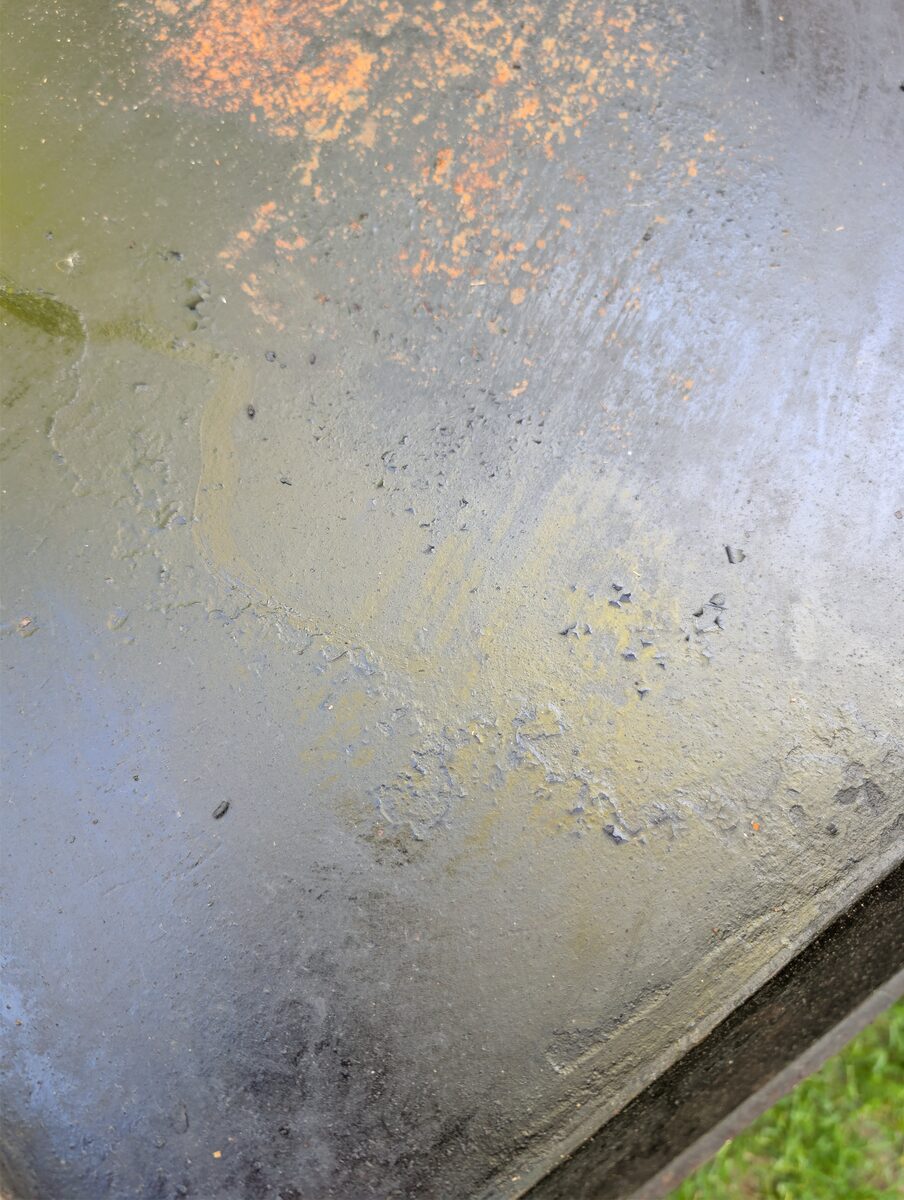 Close-up of rusted and pitted Blackstone griddle cooking surface