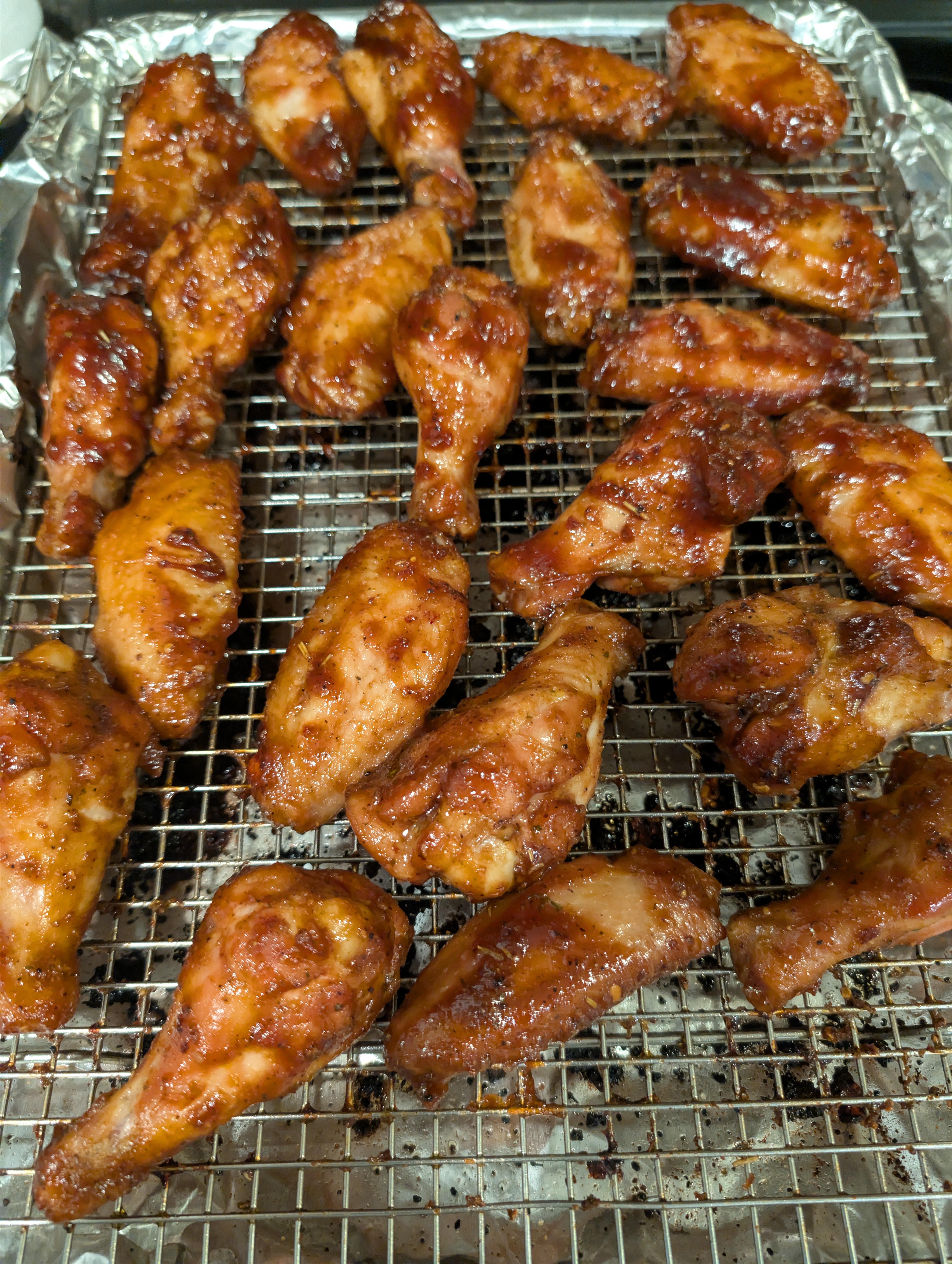 Ultra Cuisine aluminum baking sheet and airflow rack on a Pit Boss pellet grill